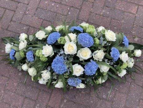 Casket spray blue and white